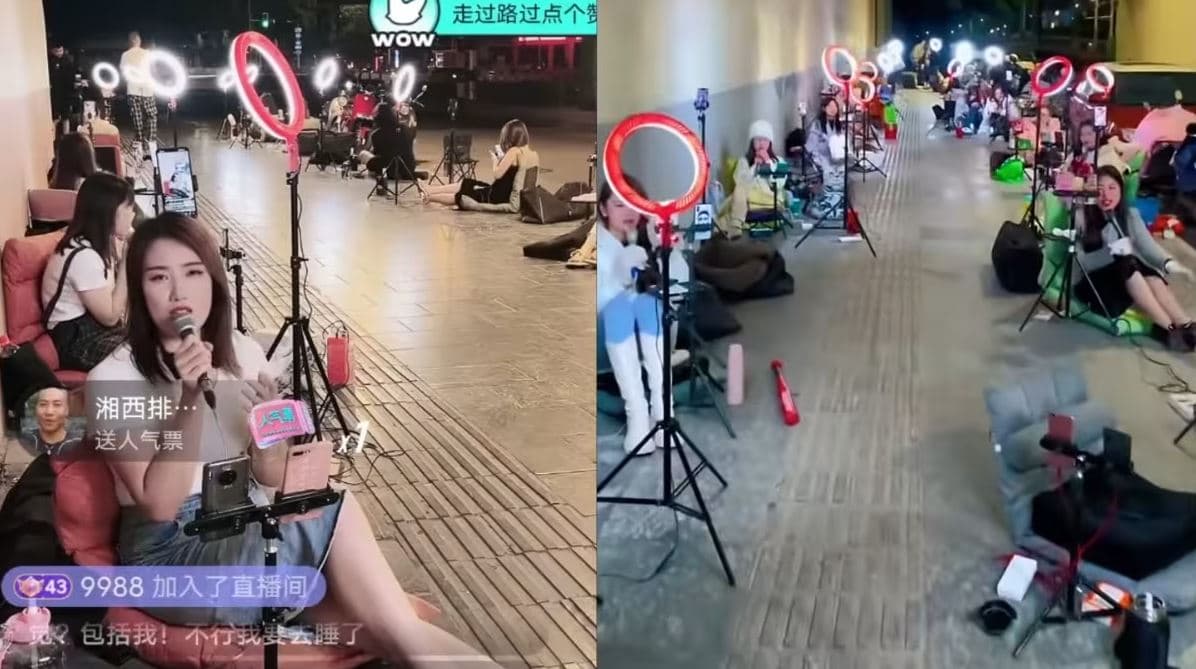 Rows of Chinese influencers using ring lights and smartphones to livestream simultaneously from a public sidewalk at night.